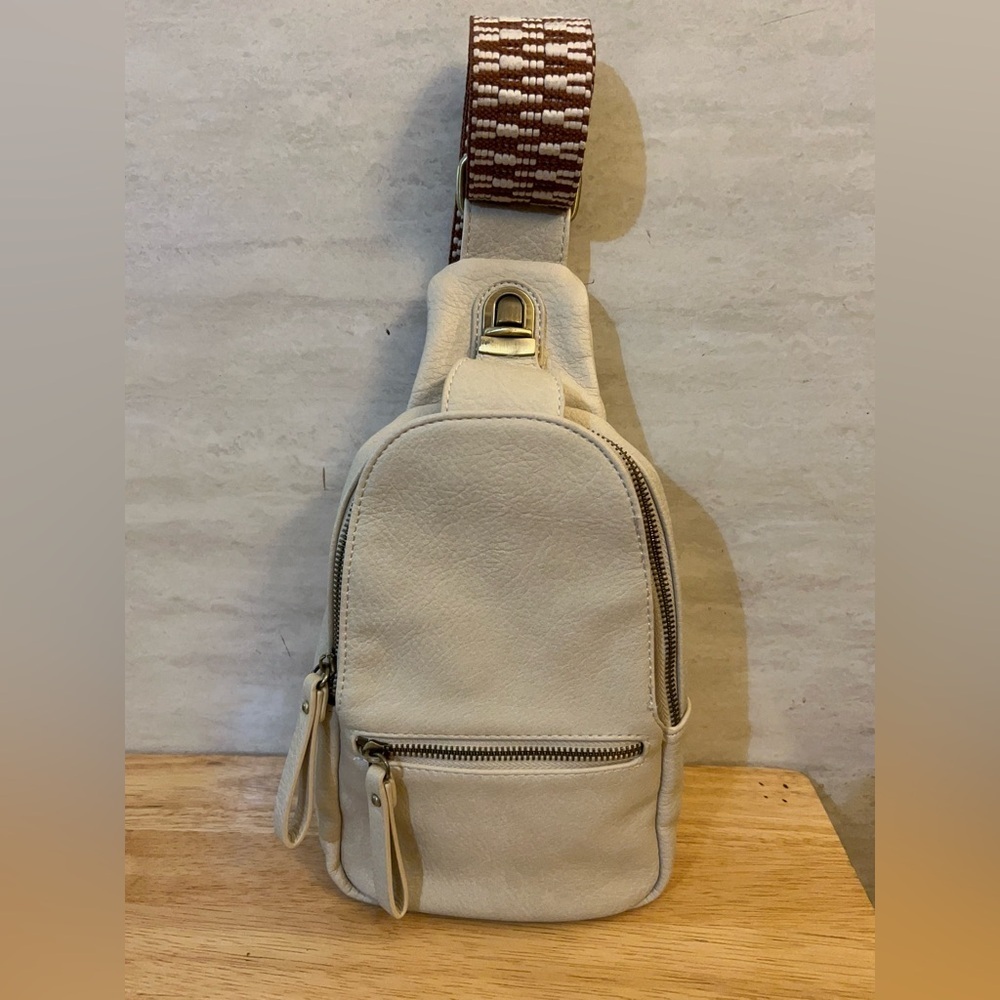 Urban Expressions Liberty leather sling bag with a chevron pattern strap. - Picture 2 of 16